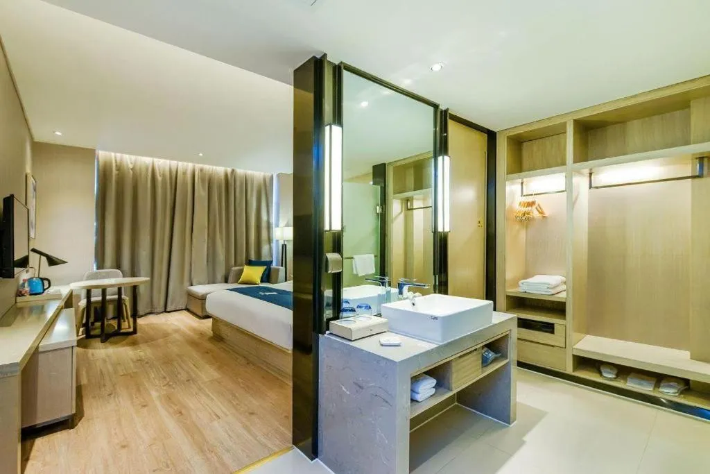 Bed in Echarm Hotel Guiyang International Convention & Exhibition Center