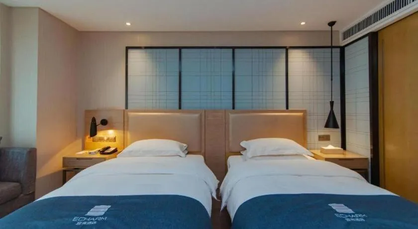 Bed in Echarm Hotel Guiyang International Convention & Exhibition Center