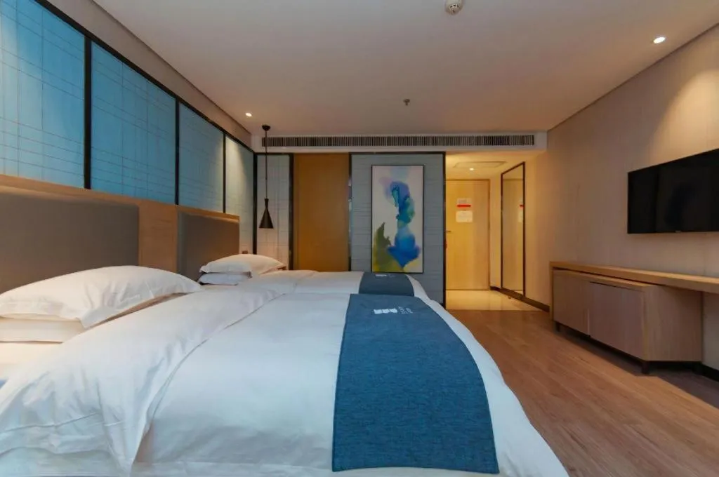 Bed in Echarm Hotel Guiyang International Convention & Exhibition Center