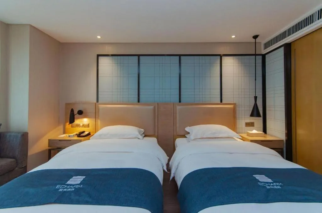 Bed in Echarm Hotel Guiyang International Convention & Exhibition Center