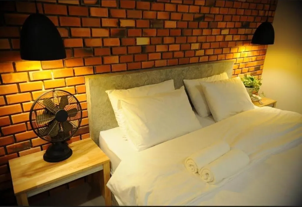 Bed in Nata Resort Chanthaburi II