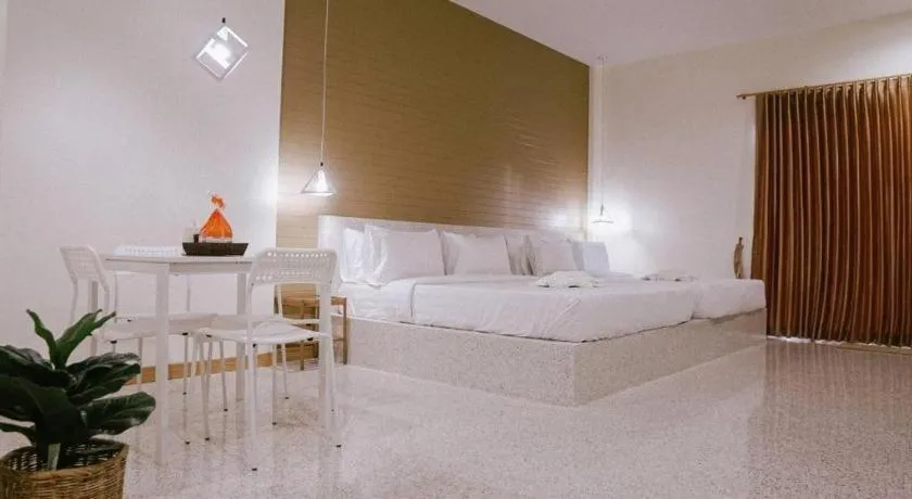 Bed in Nata Resort Chanthaburi II