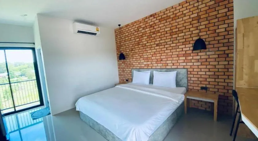 Bed in Nata Resort Chanthaburi II