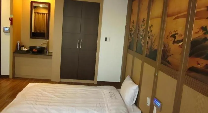 Bed in Benikea Ariul Hotel