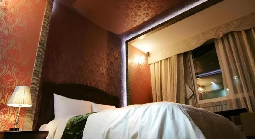 Bed in Benikea Ariul Hotel