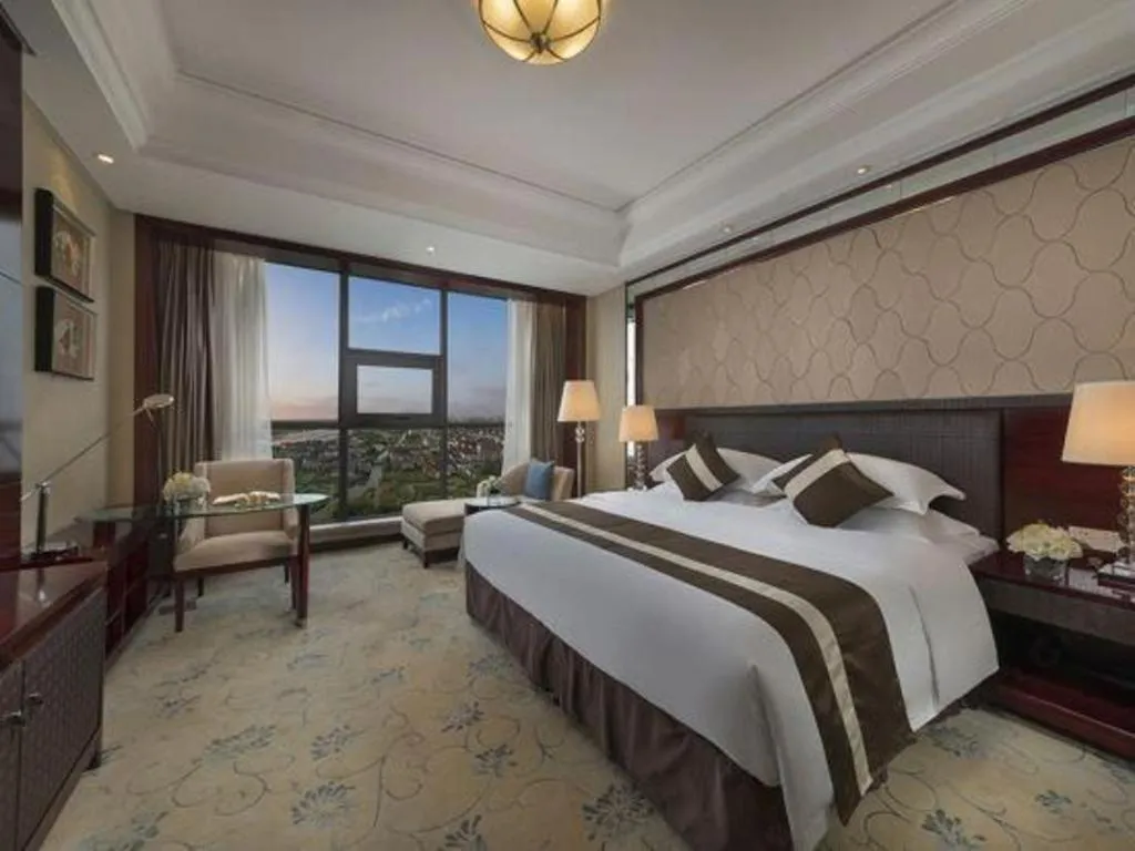 Bed in Maison New Century Hotel Cixi