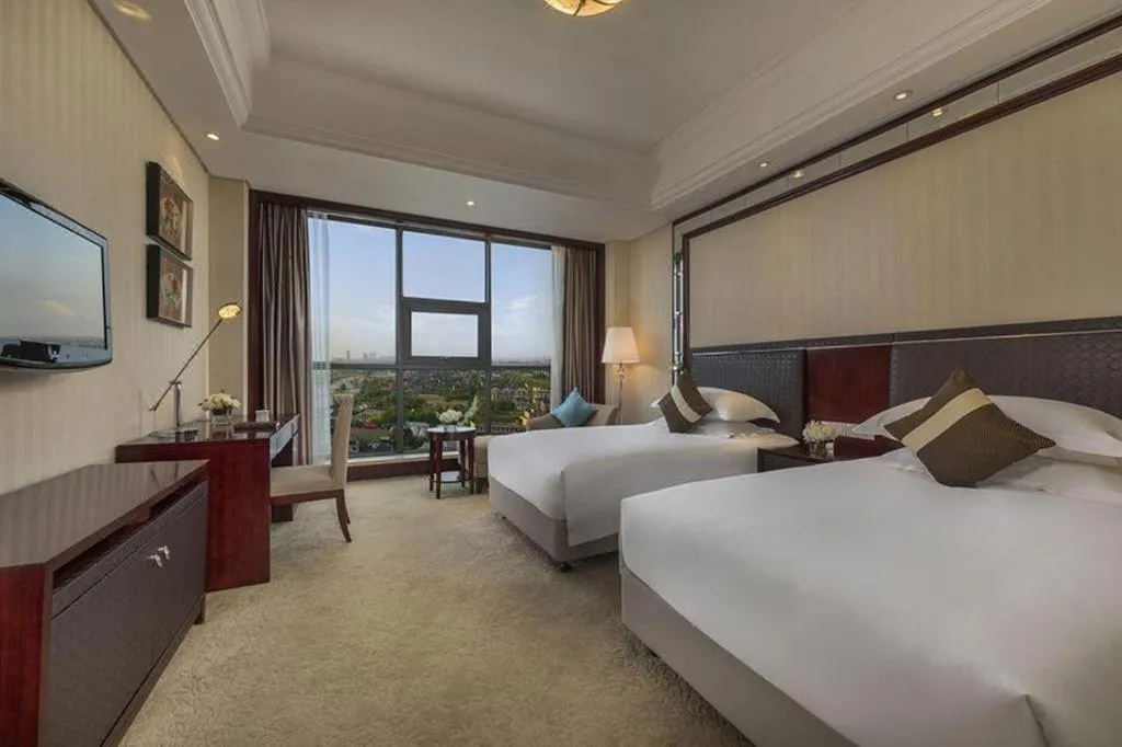 Bed in Maison New Century Hotel Cixi