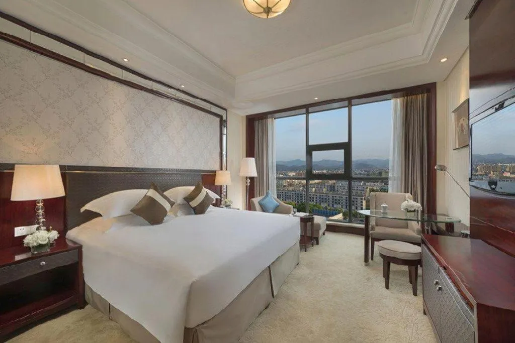 Bed in Maison New Century Hotel Cixi