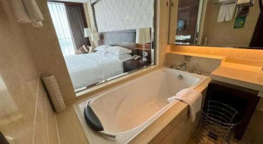 Bed in Maison New Century Hotel Cixi