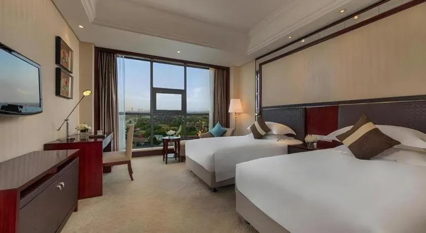 Bed in Maison New Century Hotel Cixi