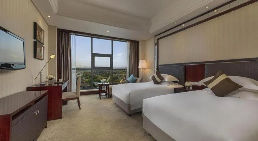 Bed in Maison New Century Hotel Cixi