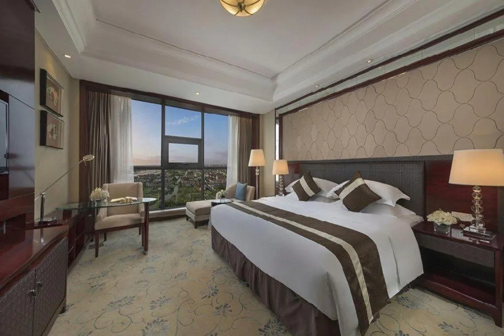 Bed in Maison New Century Hotel Cixi