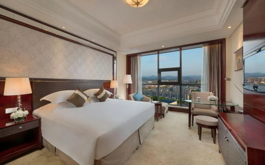 Bed in Maison New Century Hotel Cixi