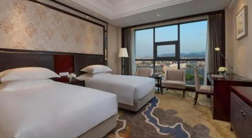 Bed in Maison New Century Hotel Cixi