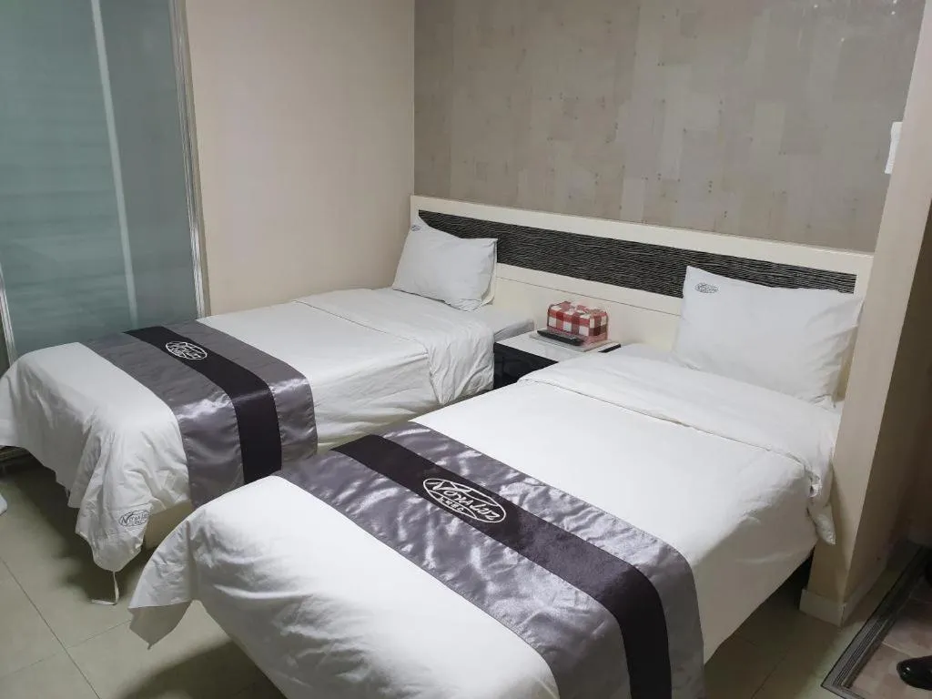 Bed in Novalus Tourist Hotel