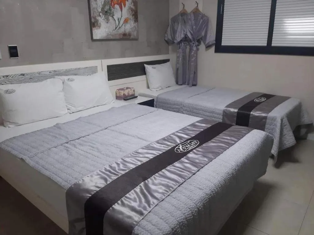 Bed in Novalus Tourist Hotel