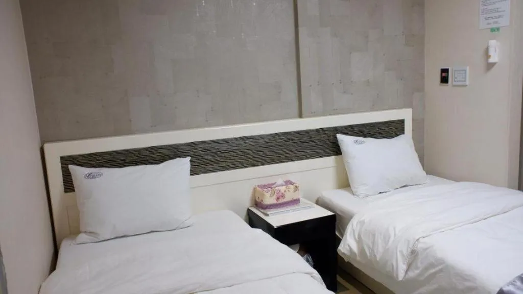 Bed in Novalus Tourist Hotel