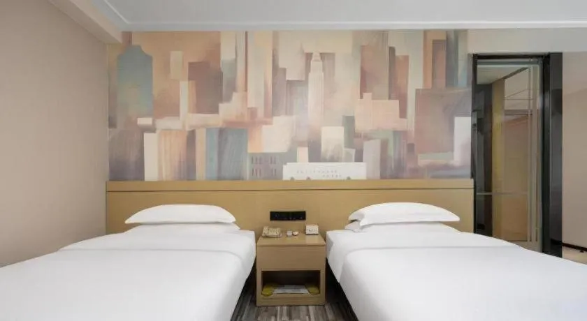 Bed in City Comfort Inn Liuzhou Beique Road Huang Village