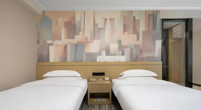 Bed in City Comfort Inn Liuzhou Beique Road Huang Village