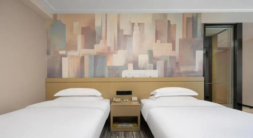 Bed in City Comfort Inn Liuzhou Beique Road Huang Village