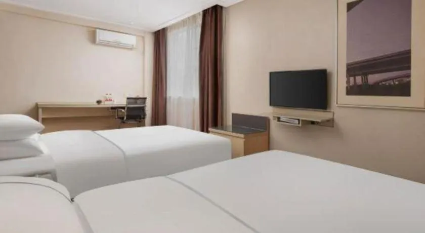 Bed in City Comfort Inn Liuzhou Beique Road Huang Village