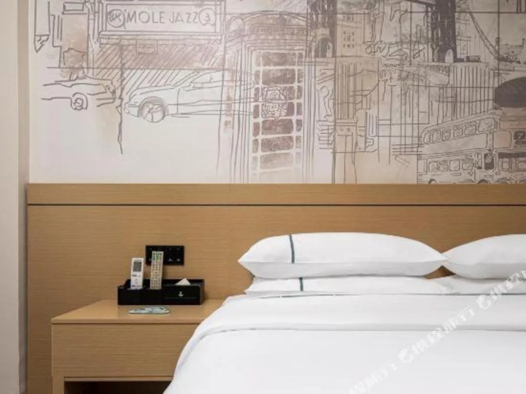 Bed in City Comfort Inn Liuzhou Beique Road Huang Village