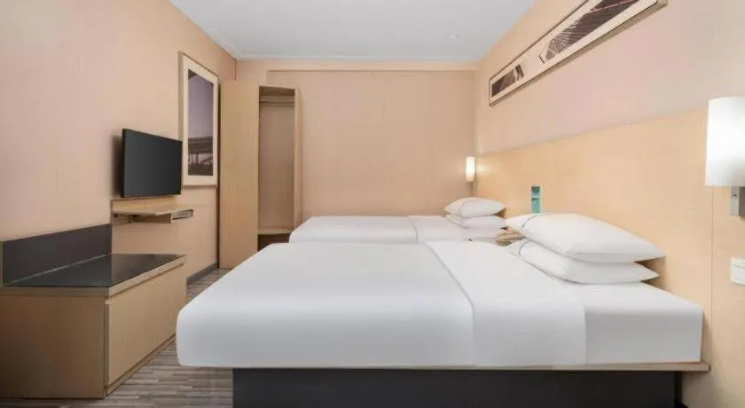 Bed in City Comfort Inn Liuzhou Beique Road Huang Village