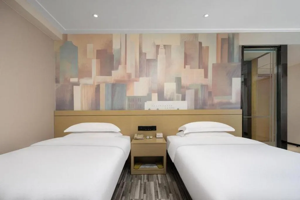 Bed in City Comfort Inn Liuzhou Beique Road Huang Village