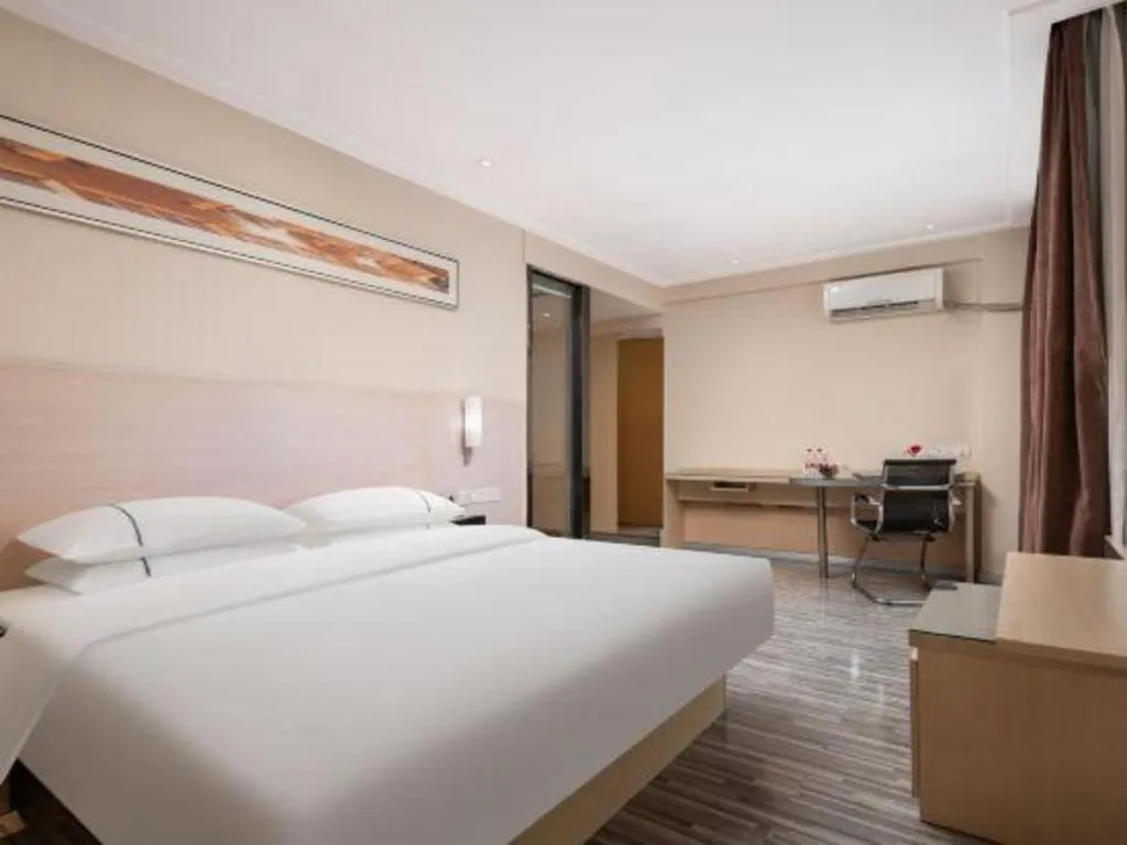 Bed in City Comfort Inn Liuzhou Beique Road Huang Village