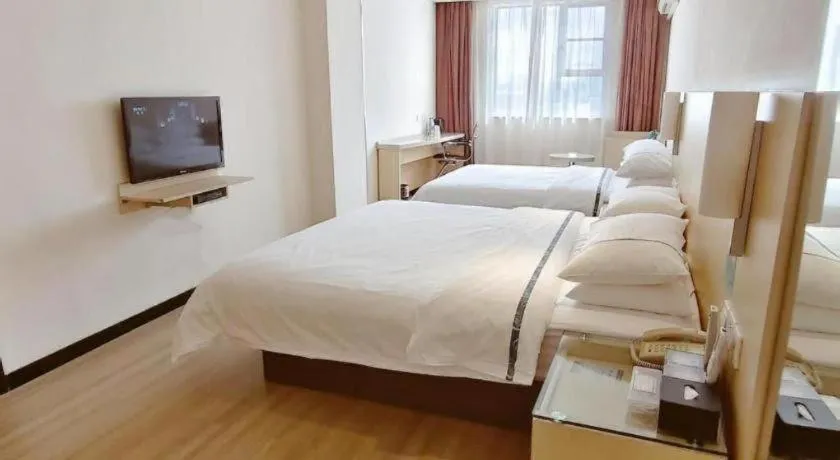 Bed in City Comfort Inn Liuzhou Beique Road Huang Village