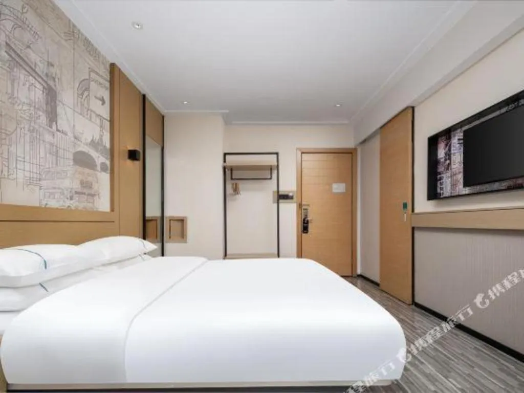 Bed in City Comfort Inn Liuzhou Beique Road Huang Village