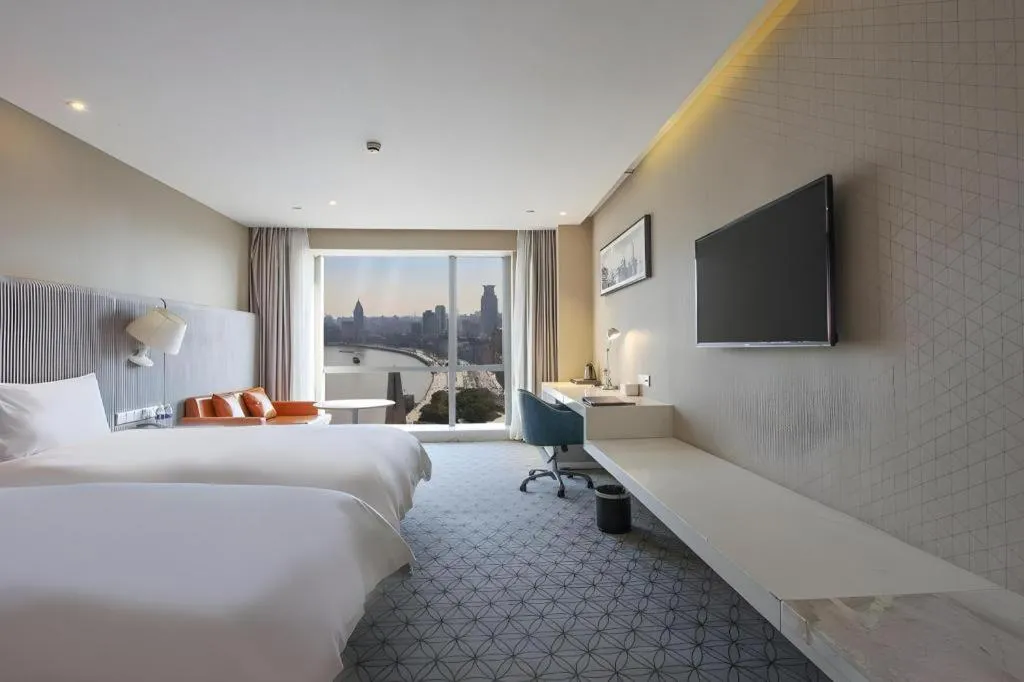 Bed in Shanghai Bund South China Harbour View Hotel