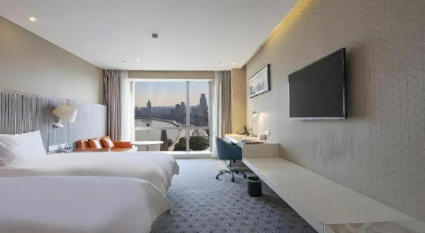 Bed in Shanghai Bund South China Harbour View Hotel