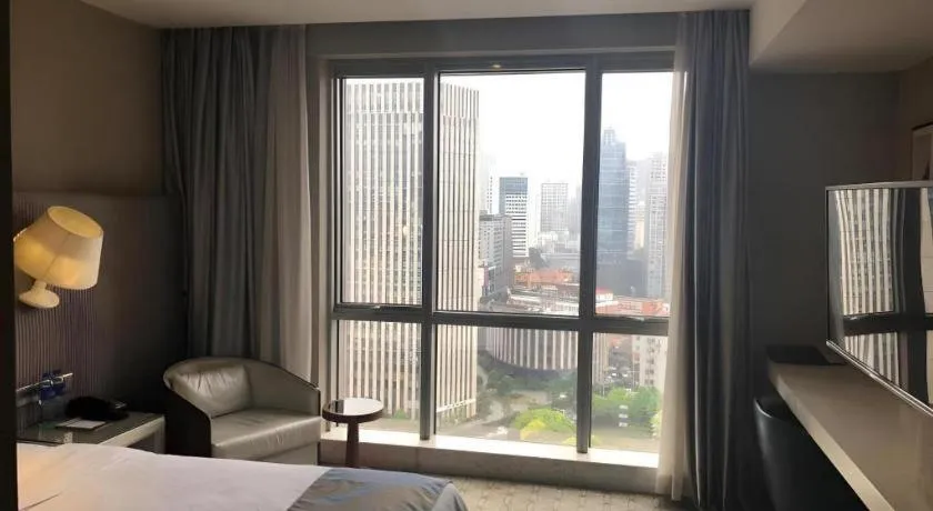 Bed in Shanghai Bund South China Harbour View Hotel