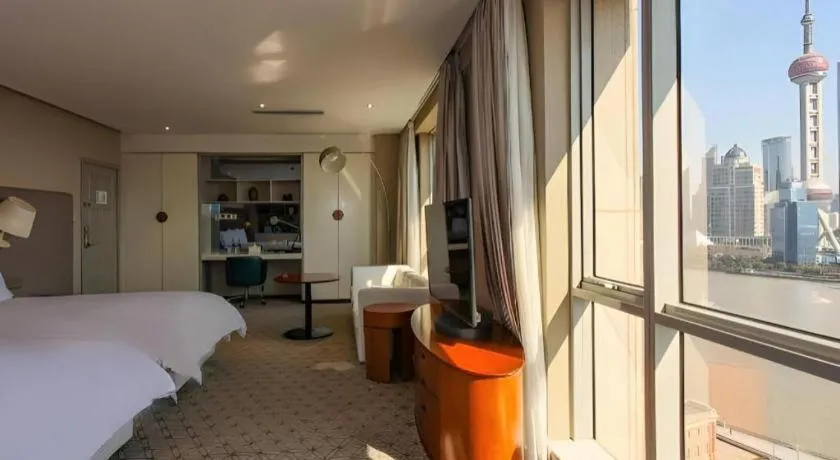 Bed in Shanghai Bund South China Harbour View Hotel