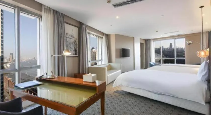 Bed in Shanghai Bund South China Harbour View Hotel