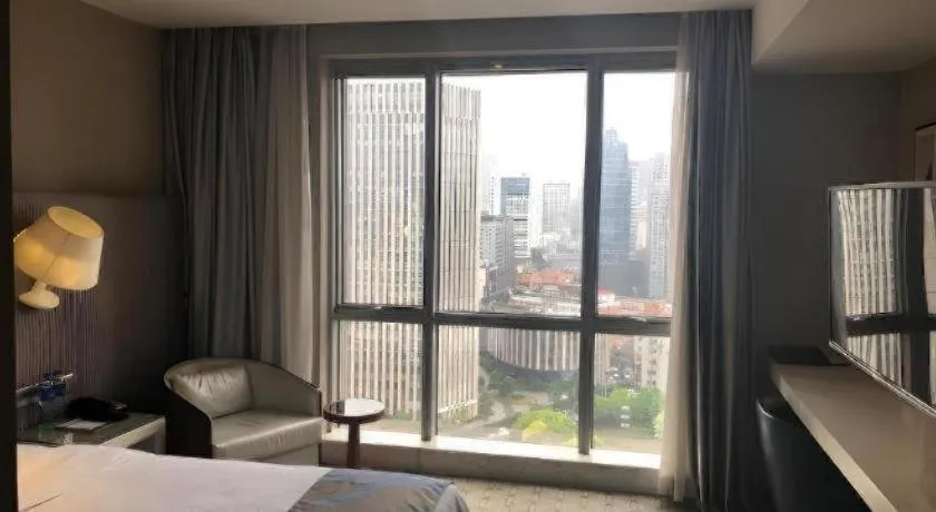 Bed in Shanghai Bund South China Harbour View Hotel