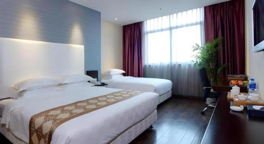 Bed in Xiamen Blue Peninsula Hotel
