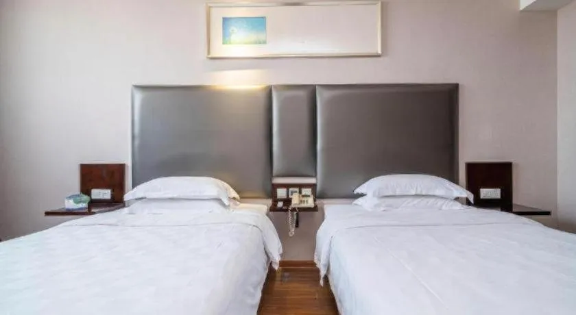 Bed in Xiamen Blue Peninsula Hotel