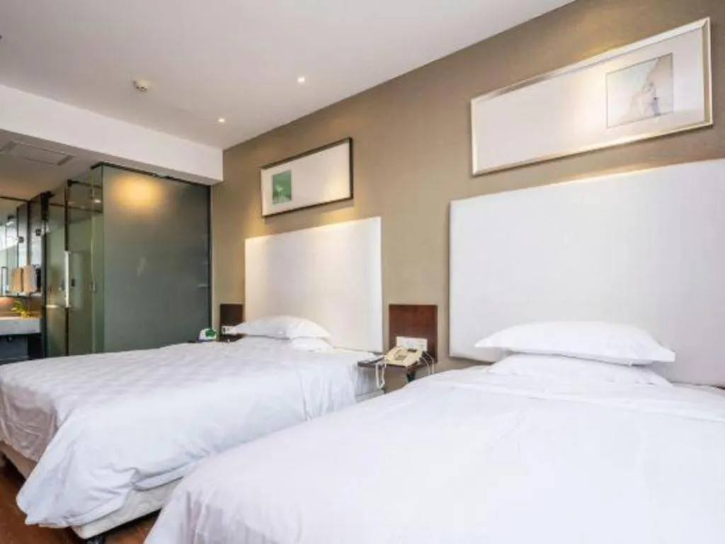 Bed in Xiamen Blue Peninsula Hotel