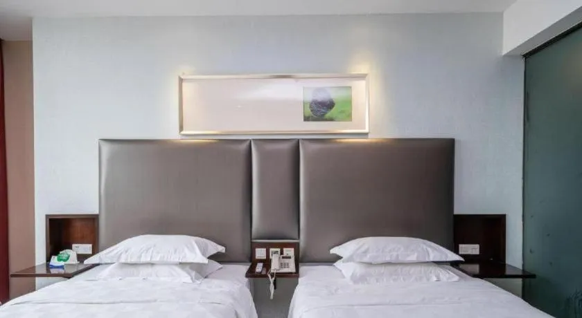 Bed in Xiamen Blue Peninsula Hotel