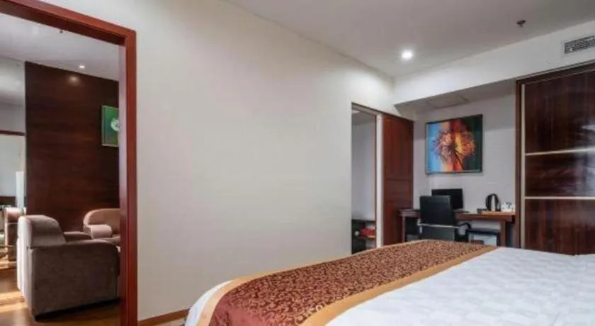 Bed in Xiamen Blue Peninsula Hotel