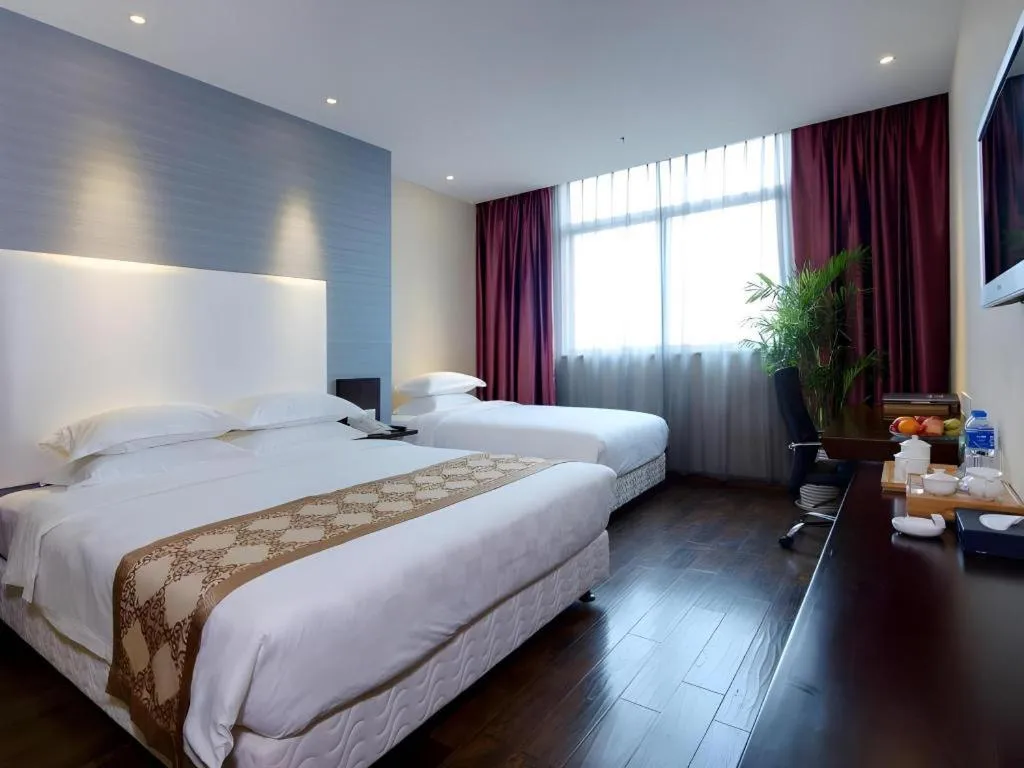 Bed in Xiamen Blue Peninsula Hotel