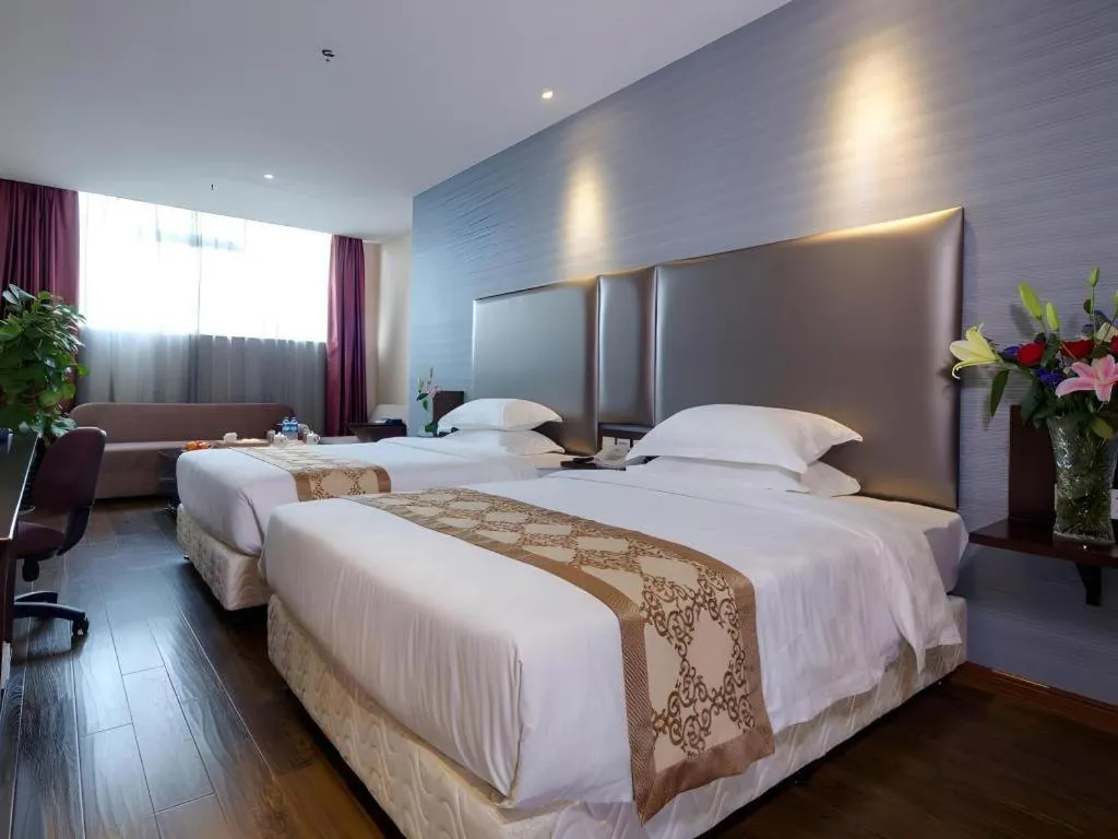 Bed in Xiamen Blue Peninsula Hotel