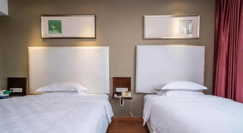 Bed in Xiamen Blue Peninsula Hotel