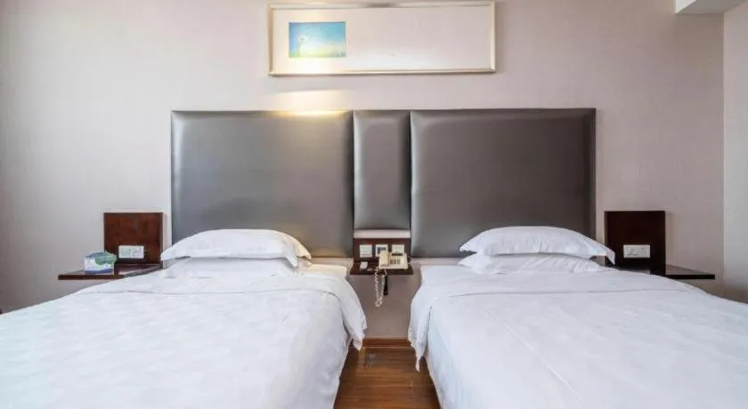 Bed in Xiamen Blue Peninsula Hotel