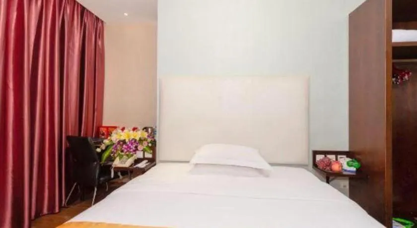 Bed in Xiamen Blue Peninsula Hotel