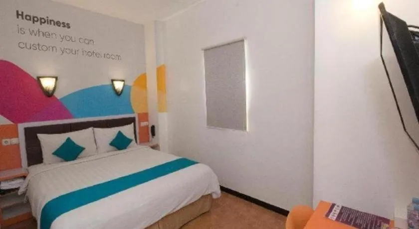 Bed in Oriza Hotel Surabaya