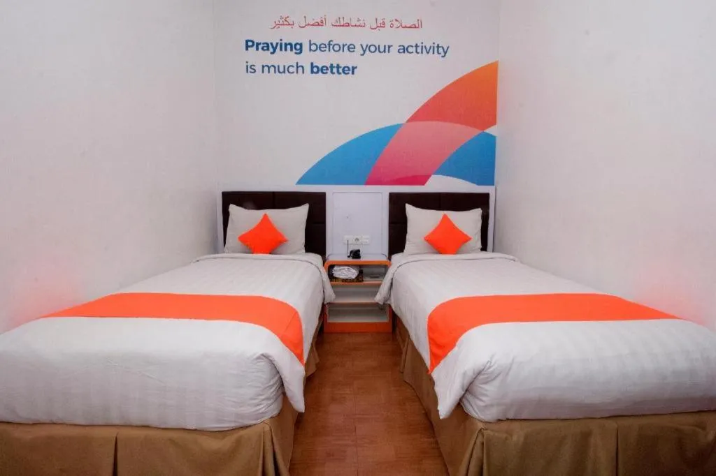 Bed in Oriza Hotel Surabaya