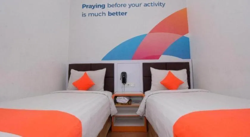 Bed in Oriza Hotel Surabaya